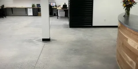 High-gloss reflective interior floor showcasing professional polished concrete steps